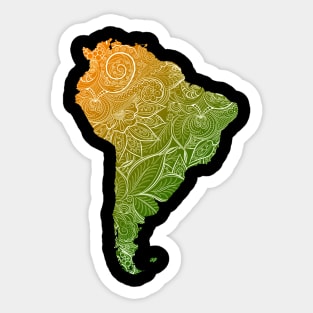 Colorful mandala art map of South America with text in green and orange Sticker